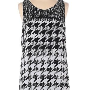 CAbi XS sleeveless black and white blouse